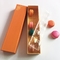 Le tiroir multicolore en carton ondulé Macaron enferme dans une boîte pour 12 avec intérieur en plastique
